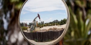 Oil futures settle at their highest price of the year