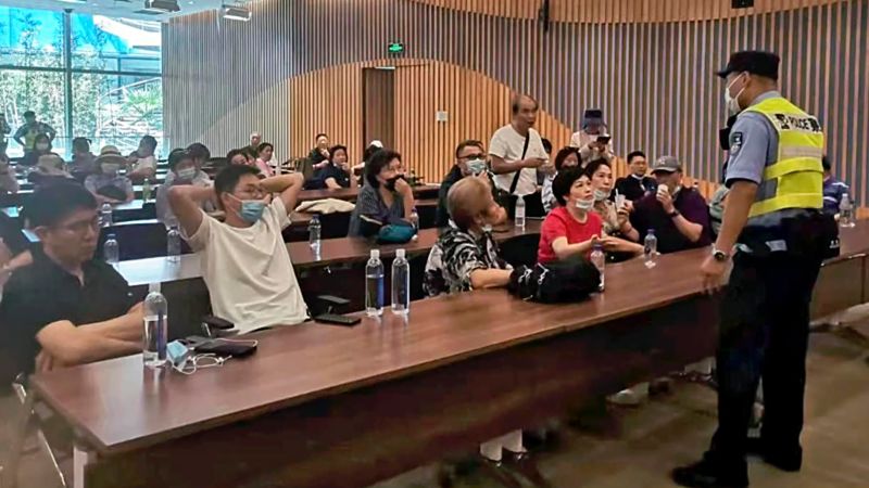 Evergrande’s woes deepen after police detain staff at its shadow bank