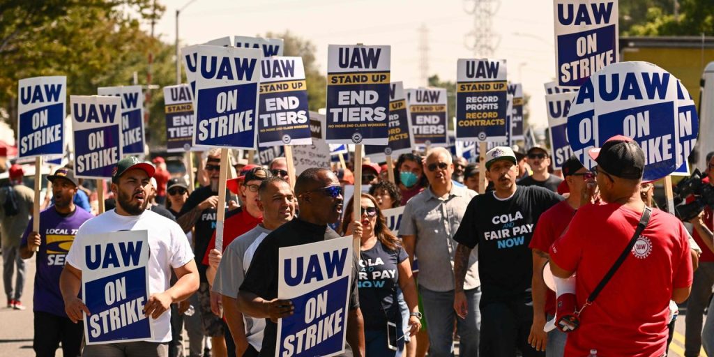 UAW says picketing workers are getting hit by cars, having guns pulled on them