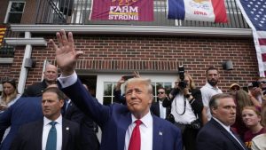 In Iowa, Trump and DeSantis take the campaign to the tailgate tent